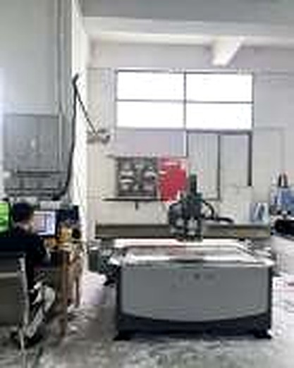 Numerically controlled engraving equipment shown in the company brochure