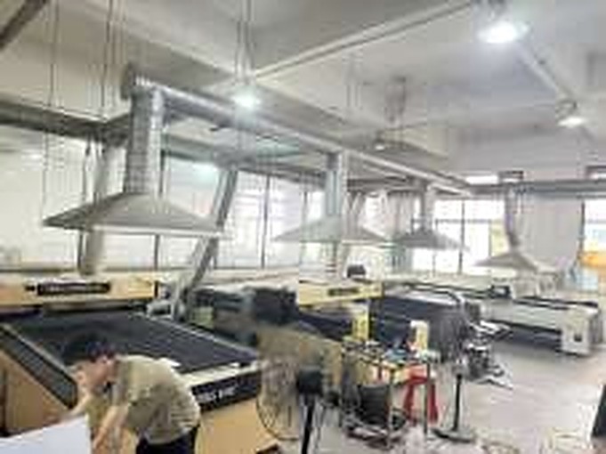 Production workshop photograph supplied in the COLLECTION COLOR ADVERTISING company brochure