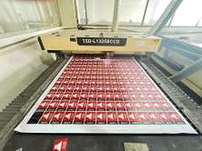 Laser processing equipment in the company workshop