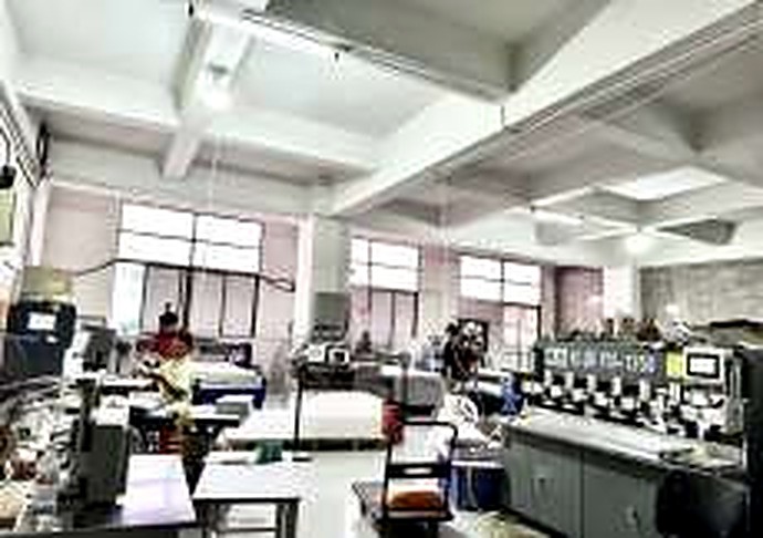 Acrylic edge-polishing equipment shown in the company workshop