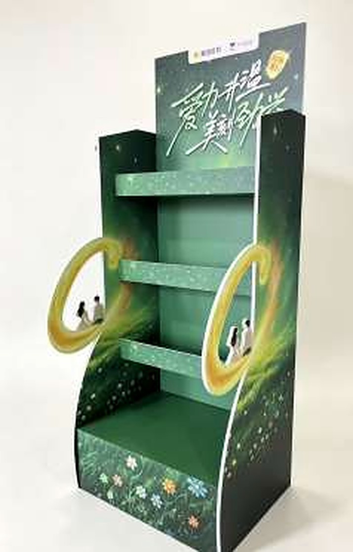 Real printed PVC retail display fixture photographed in company brochure